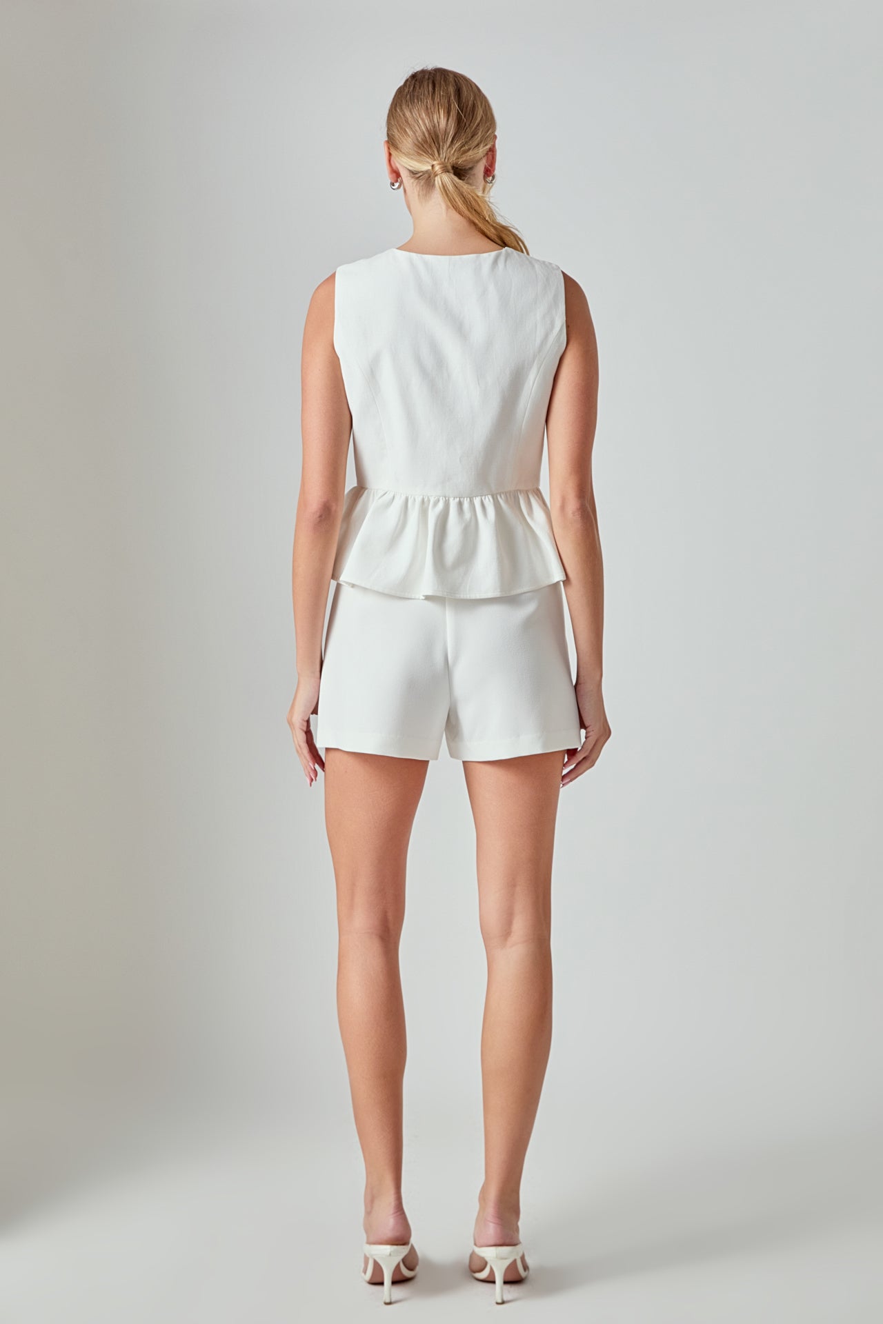 Charlotte Sleeveless Peplum Top