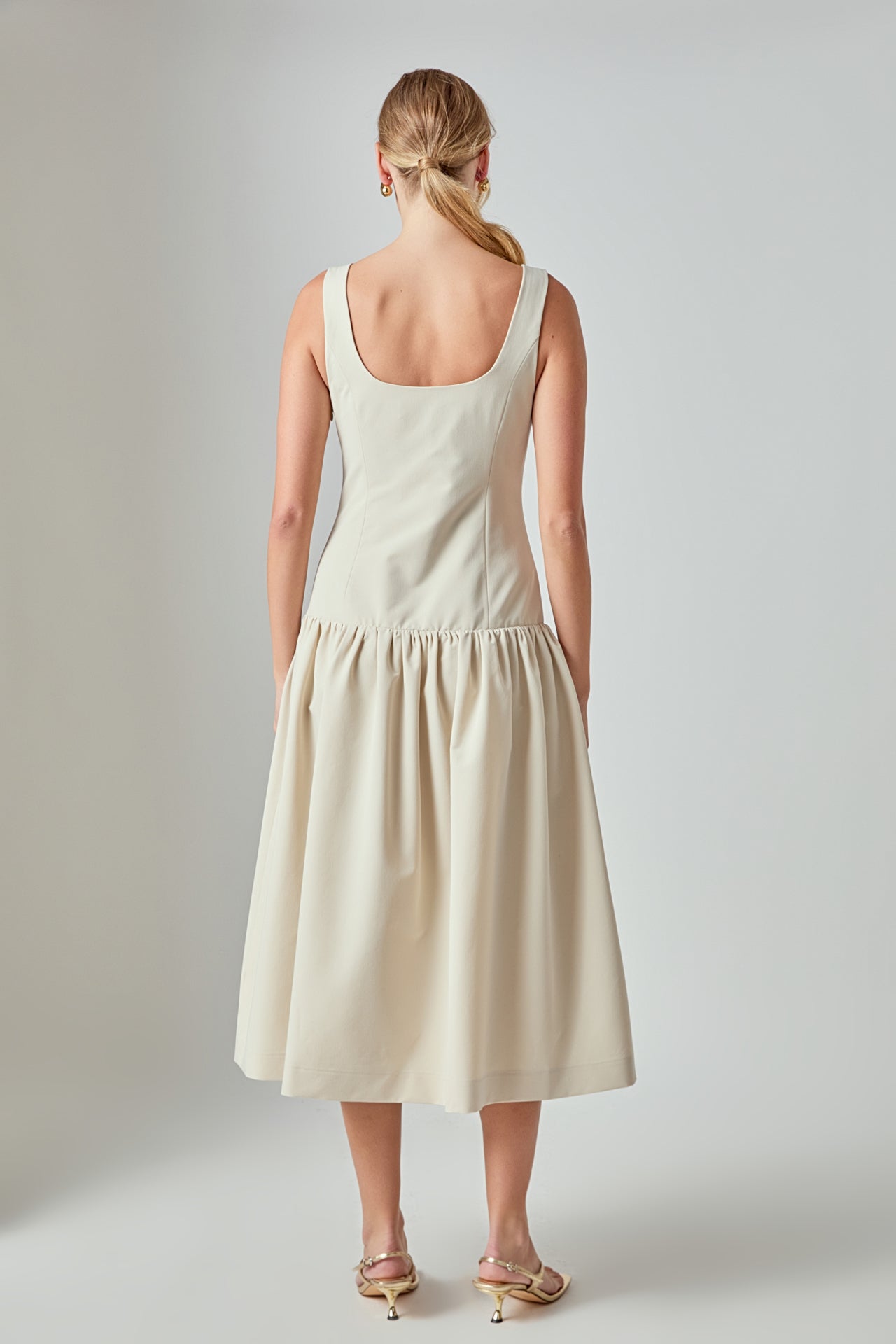 Amber Drop Waist Peplum Midi Dress